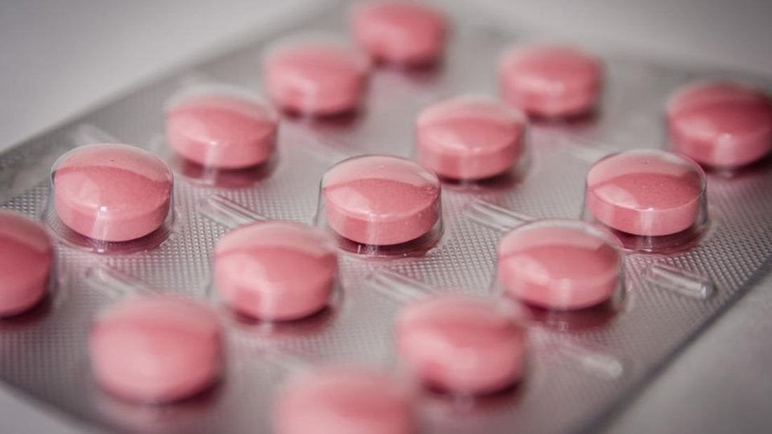 Close-up of pink tablets in a blister pack